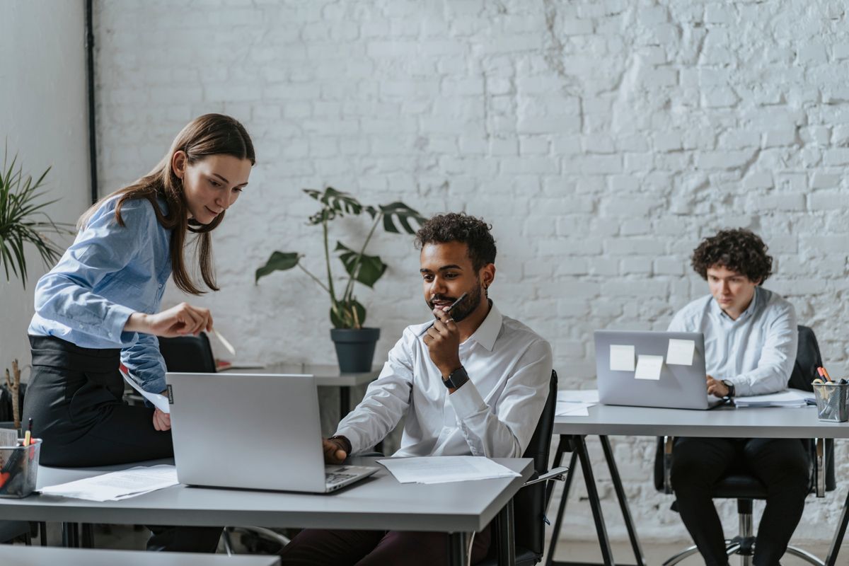 Colleagues at work in a bright office