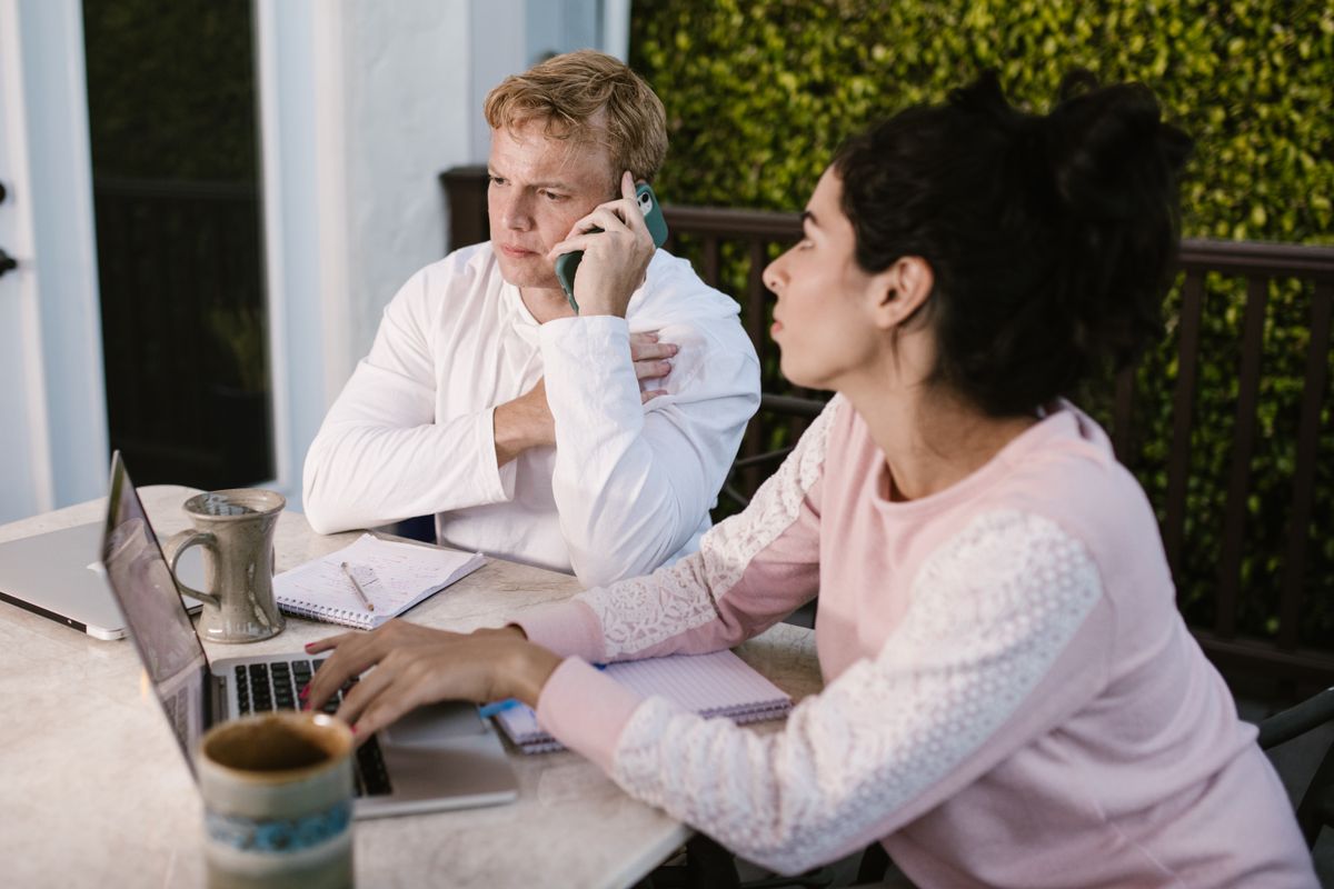 Colleagues working together at a desk