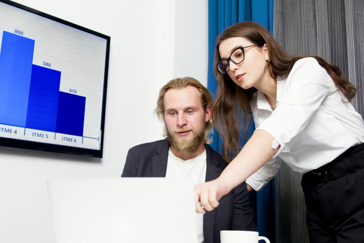 Two people at a computer